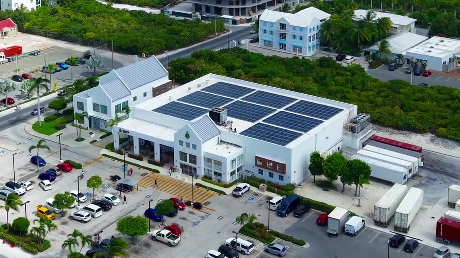 Aerial over the Graceway Gourmet building and its solar roof